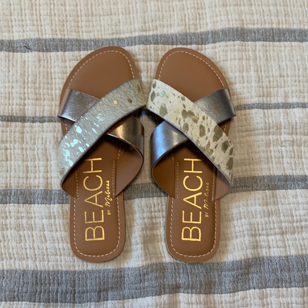 Brand new. Never been worn sandals
